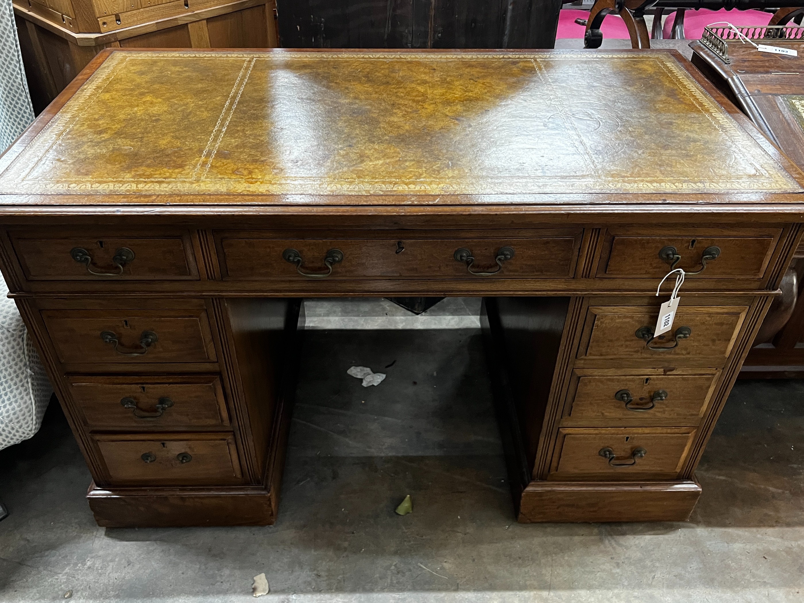 An early 20th century mahogany pedestal desk, width 122cm, depth 66cm, height 77cm